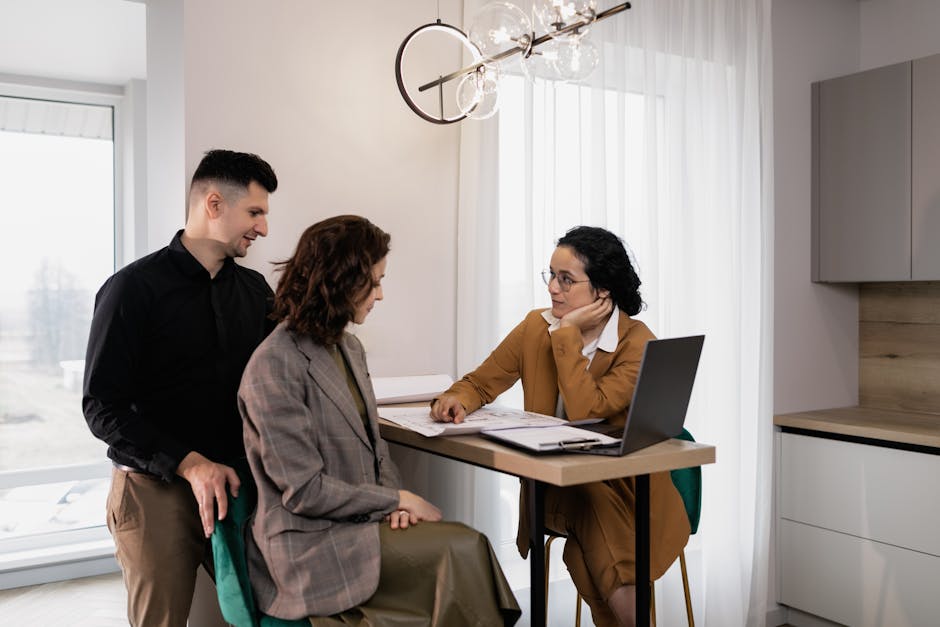 Professional real estate agent consulting with clients